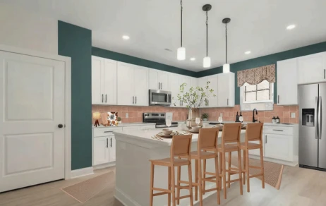 Kitchen after render: white cabinets, island, and appliances
